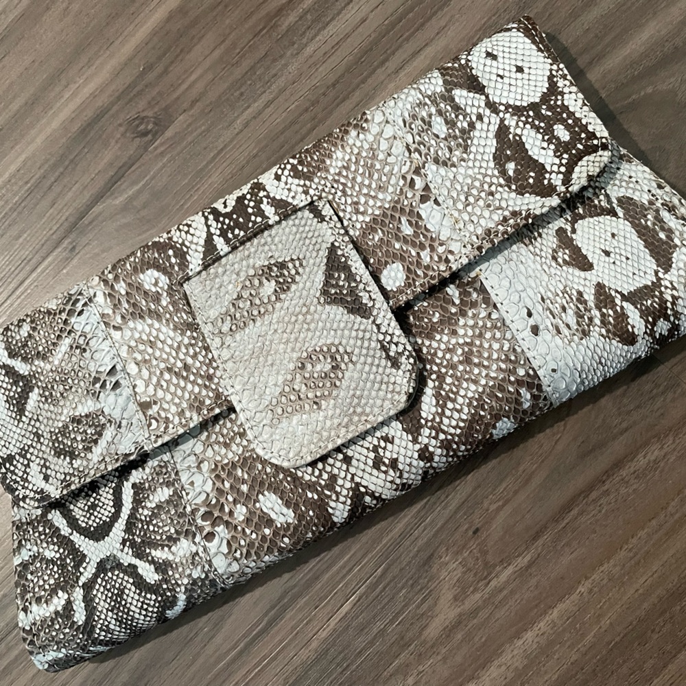 Snakeskin printed clutch